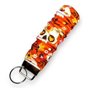 SKULLS AND FALL ON ORANGE SCRUNCHIE KEY FOB